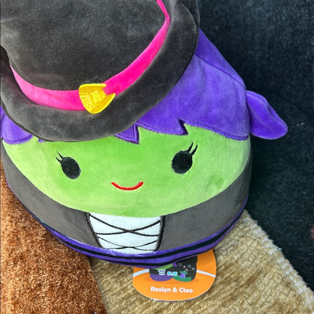 Black and Green Stuffed Animal